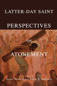 Cover of the book Latter-day Saint Perspectives on Atonement, with a painting of Christ carrying the cross beam and a blurred crowd behind Him.